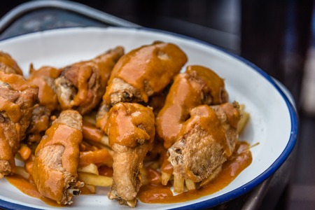 Spicy chicken wings in tapas barの写真素材