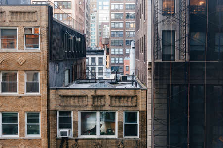Cityscape of New York with old buildings and water towers