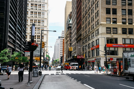 Street scene in Broadway with Liberty Street in Financial Distriのeditorial素材