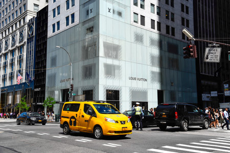 View along Fifth Avenue in New York with luxury retail spaces