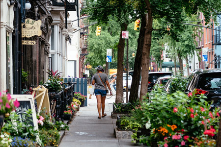 Woman walking by colorful street in New York