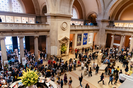 New York City, USA - June 23, 2018: Crowd of people at main hall of Metropolitan Museum of Art. The MET is the third most visited art museum in the worldのeditorial素材