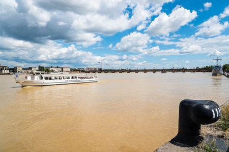 Touristic ferry sailing on River Garonne in Bordeauxのeditorial素材