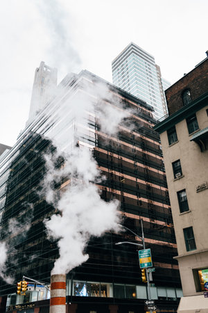 Low angle view of steam coming out stack for venting the districのeditorial素材