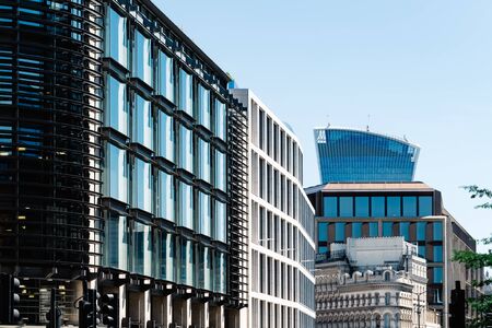 Low angle view of  modern office buildings in Londonの写真素材