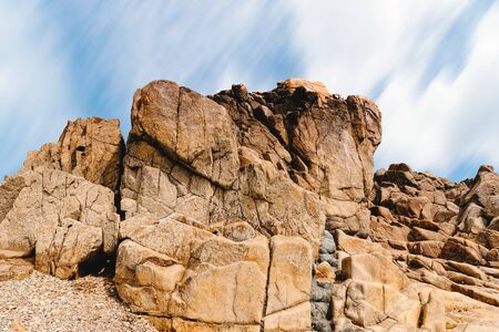 Rock formation against sky in Sillon de Talbert areaの写真素材