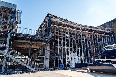 Ruins of modern industrial building after fire