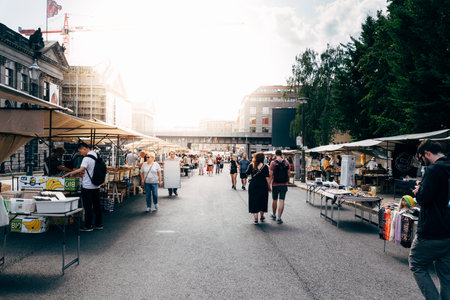 Street flea market in Berlin Mitte with sun flareのeditorial素材