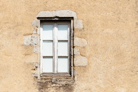 Old wooden window in french house, vintage background