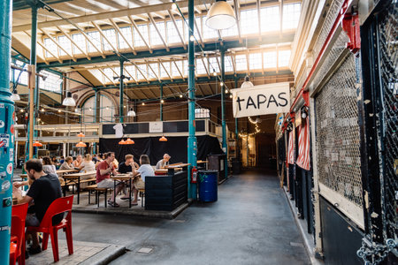 View of Markthalle Neun, a historical market with street food in Kreuzberg borough in Berlin