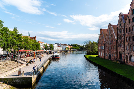 Scenic view of Trave River and Salzspeicher buildings in Lubeck, Germany
