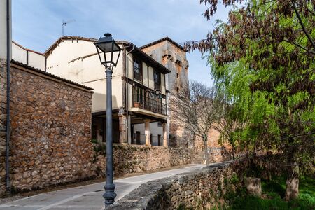 Picturesque view of the promenade along the river Arlanza in Covarrubiasの写真素材