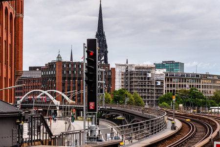 Subway on steel bridge against cityscape of Hamburgのeditorial素材