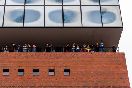 Low angle view of peopkle looking down from the terrace of Elbphilharmonie of Hamburgのeditorial素材