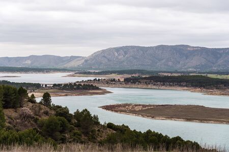 Buendia reservoir with turquoise waters in spring. La Alcarria region, Spainの写真素材