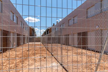 Exterior view of modern townhouses with brick facadeの写真素材