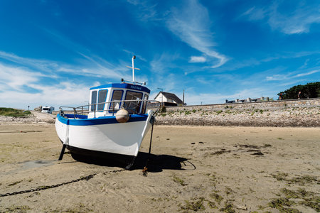 Stranded ships at low tide in the beach in Brittanyのeditorial素材