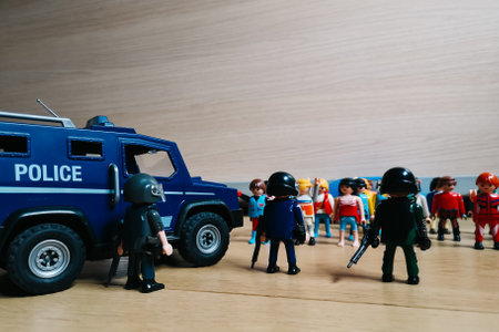 Playmobil figurines in scene representing antiriot police standing against protestersのeditorial素材