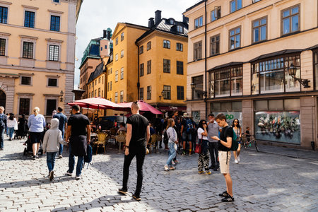 View of crowded street in Gamla Stan in Stockholmのeditorial素材