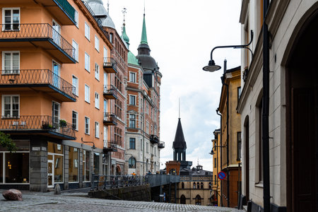Picturesque cobblestoned street with colorful houses in Sodermalm in Stockholmのeditorial素材