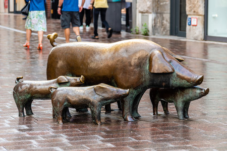 Bremen, Germany - August 5, 2019: Hirt mit Schweinen or Shepherd with pigs sculpture in centre of cityのeditorial素材