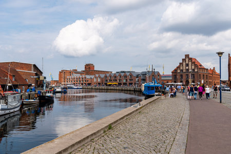 The Old Hansa Harbor of Wismar with boats selling fresh seafoodのeditorial素材