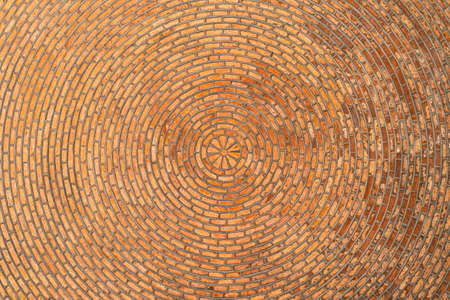 Red brick vault. Ceiling. Circular pattern. Architectural textureの写真素材