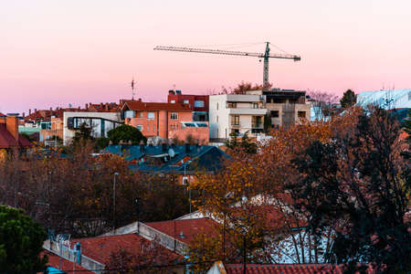 cityscape of residential district at sunset during Autumn