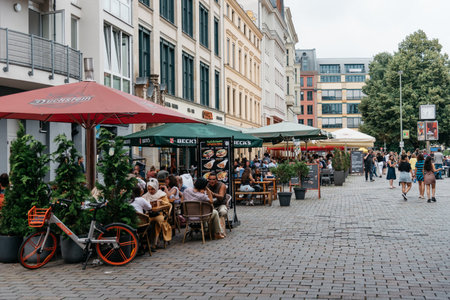 People enjoying in restaurants and terraces in Hackescher Markt in Berlinのeditorial素材