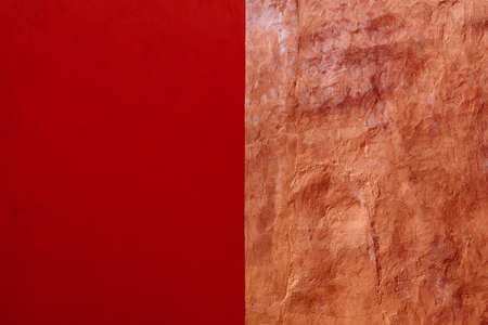 Abstract Grunge Decorative Dark and Light Red Stucco Wall Backgroundの写真素材