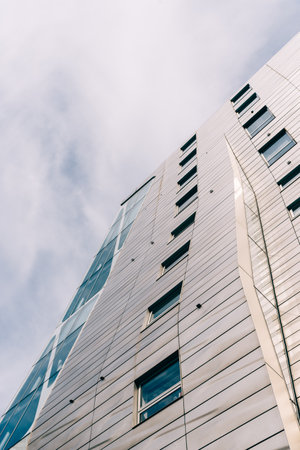 Futuristic office building with metal and glass facade in New Yorkのeditorial素材