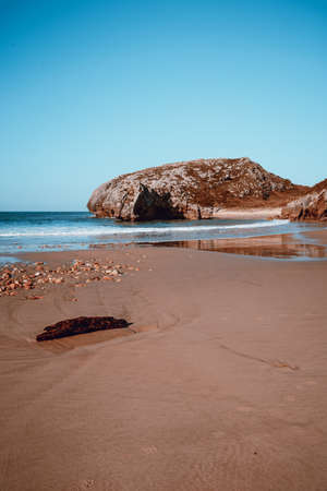 Beach of Cuevas del Mar, Caves of the sea, Llanes, , Spainの写真素材