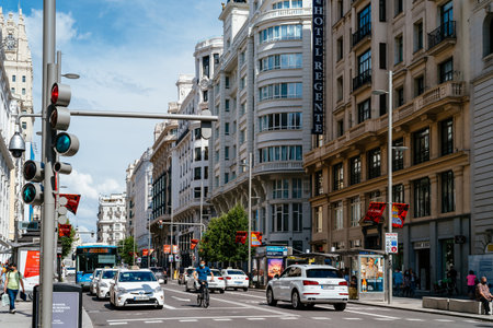 Busy street scene in Gran Via Avenue in Madridのeditorial素材