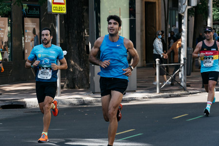 Group of runners in full effort during the Madrid marathon raceのeditorial素材