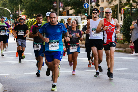 Group of runners in full effort during the Madrid marathon raceのeditorial素材