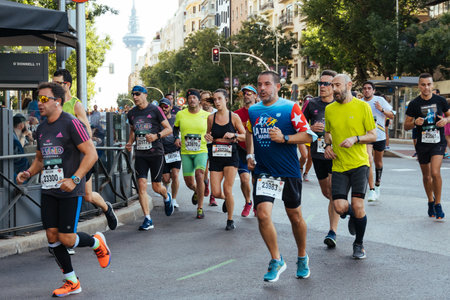 Group of runners in full effort during the Madrid marathon raceのeditorial素材
