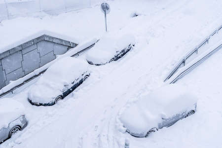 View of a highway in the city covered in snow during heavy snowfallの写真素材