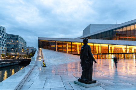 Exterior view at night of Opera house in Osloのeditorial素材