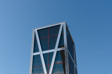 Exterior view of modern office skyscraper in Madrid. Leaning towerのeditorial素材