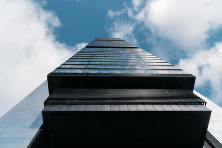 Skyscraper against sky in Cuatro Torres financial district of Madridのeditorial素材