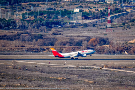 Iberia airline airplane taking off from Adolfo Suarez Madrid-Barajas airport