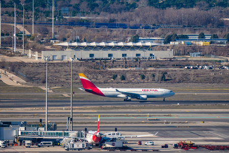 Iberia airline aircrafts in the runways of Adolfo Suarez Madrid-Barajas airportのeditorial素材