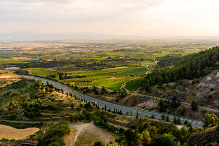 Aerial view of highway through mountains in Rioja Regionの写真素材