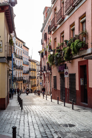 Typical street in Lavapies amidst old residential buildingsのeditorial素材