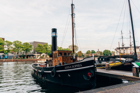 Old wooden vessels moored in the Vereniging Museum of Amsterdam