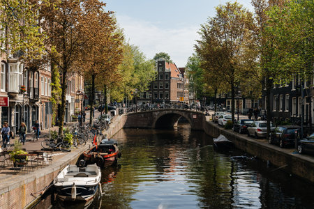 Scenic view of the waterfront of canal with typical Dutch houses in Amsterdamのeditorial素材