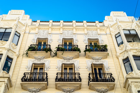Old residential building with iron balconies in the downtown of Madridのeditorial素材