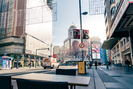 Street view of Gran Via Avenue in Central Madrid. Terraceのeditorial素材