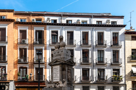 Old residential building with iron balconies in the downtown of Madridのeditorial素材