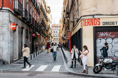 Busy street scene in Embajadores Neighborhood in central Madridのeditorial素材